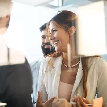 Kyocera Group woman smiling in meeting