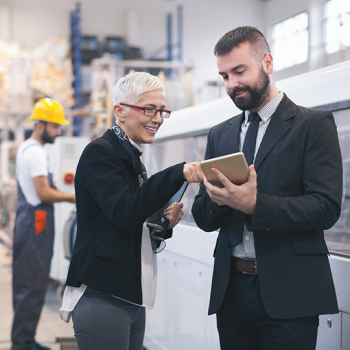 Flexible software that fits your business businessmen in a factory