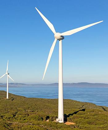Thinking and acting ‘green’ close up of wind turbines