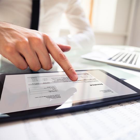 About Kyocera Capture Manager hand working with a tablet