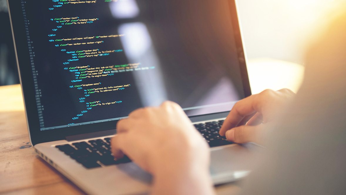 close up of a laptop screen showing coding close up of a laptop screen showing coding