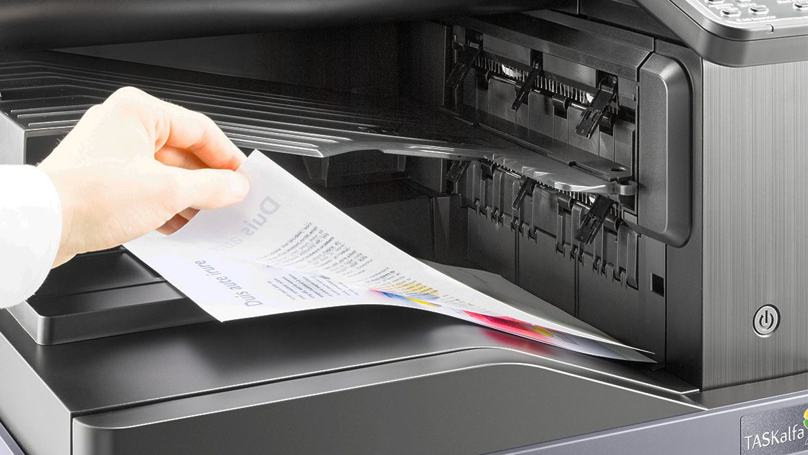 hand retrieving items from a printer hand retrieving items from a printer