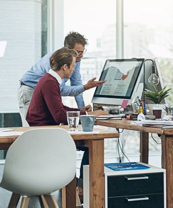 Multi-Functional Products for day-to-day tasks men looking at computer in an office